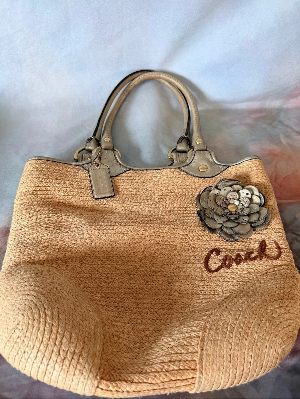 Coach Beige Straw Tote with Leather Handles and Floral Appliqué